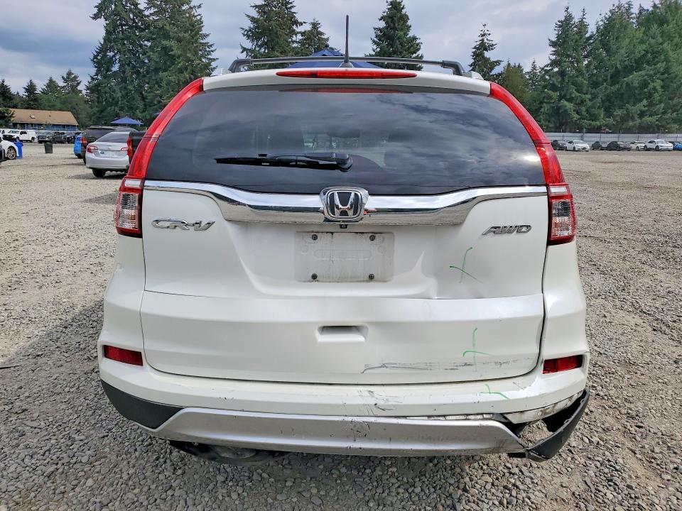 Photo 6 from auction – 2016 HONDA CR-V with VIN 5J6RM4H74GL111660