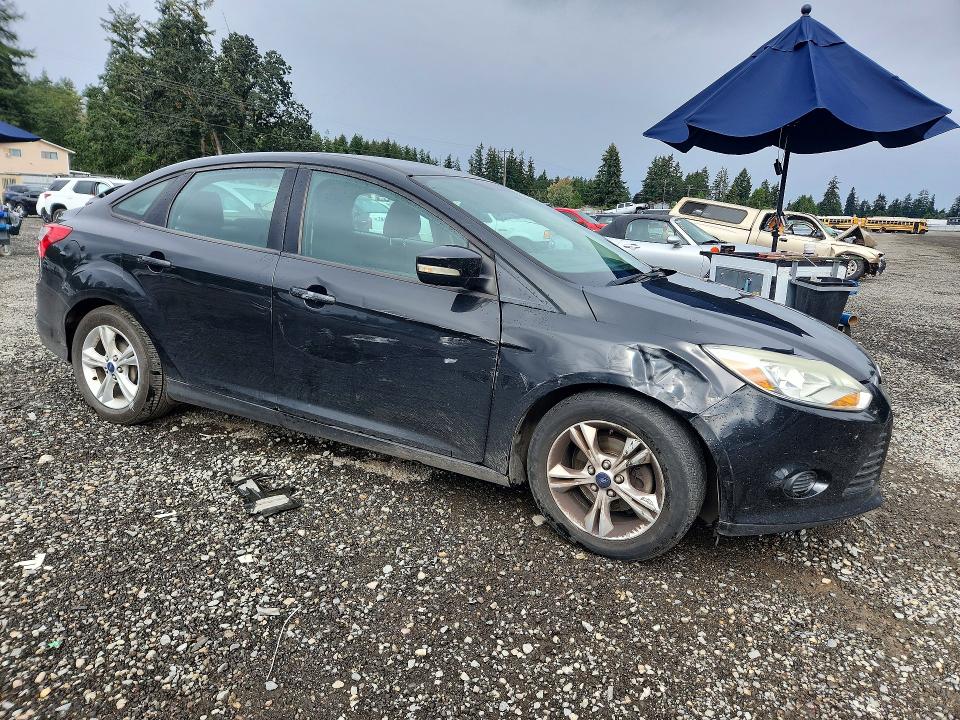 Photo 4 from auction – 2014 FORD FOCUS with VIN 1FADP3F22EL392255