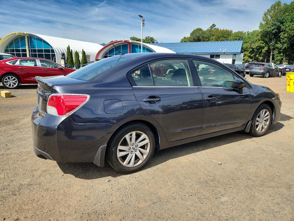 Снимка 3 от търг – 2016 SUBARU IMPREZA с VIN JF1GJAB60GH005803