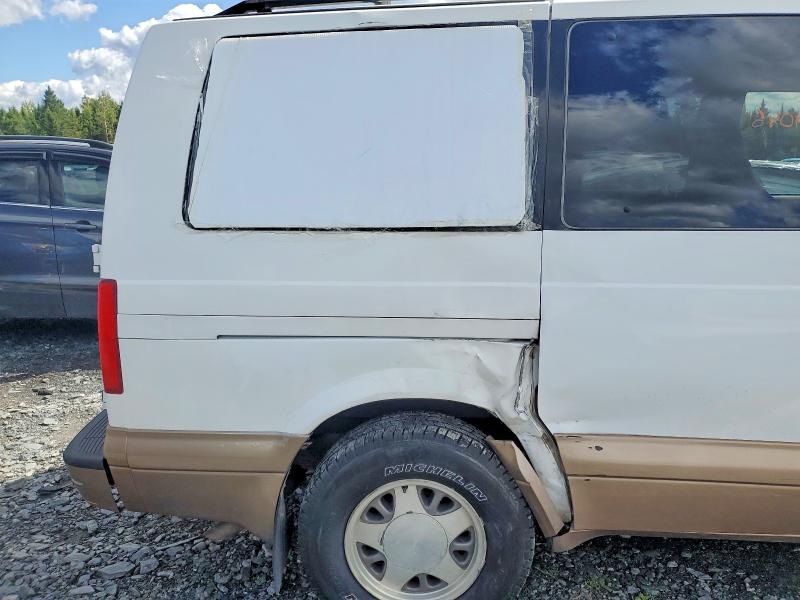 Снимка 13 от търг – 1998 GMC SAFARI с VIN 1GKDM19W3WB522044