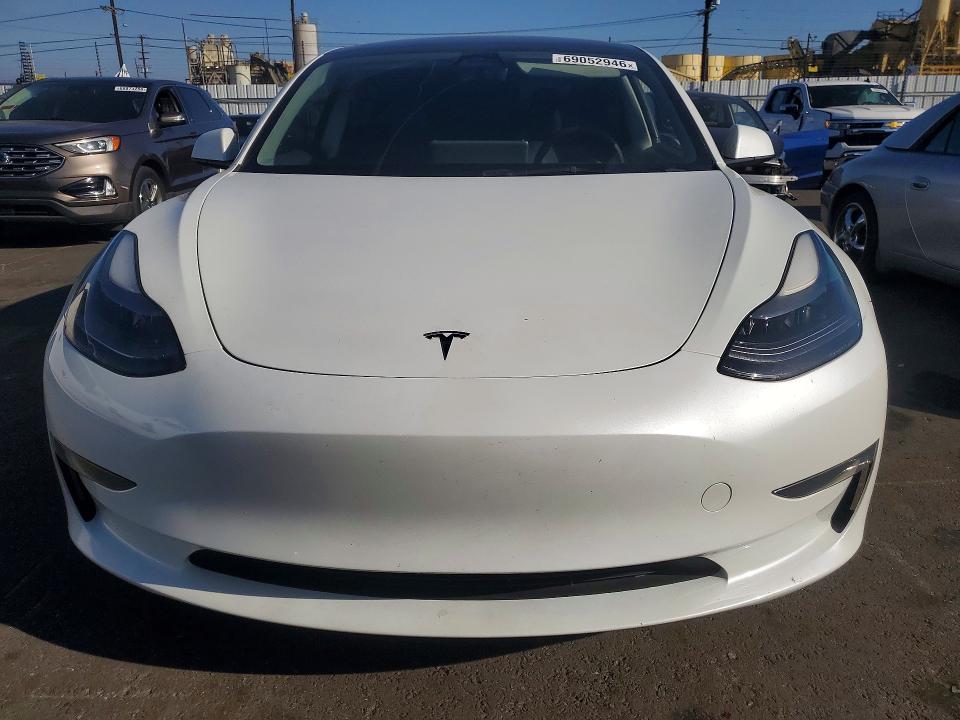 Снимка 5 от търг – 2023 TESLA MODEL 3 с VIN 5YJ3E1EA2PF517379