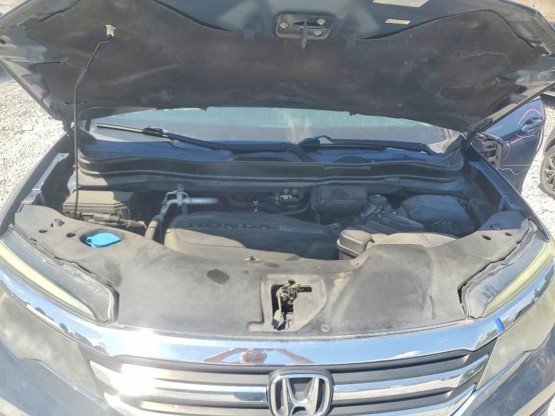 Снимка 12 от търг – 2016 HONDA PILOT с VIN 5FNYF6H55GB013181