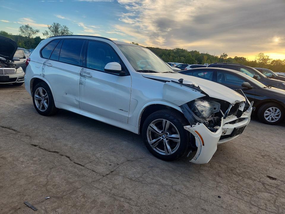 Foto 4 de la subasta – 2014 BMW X5 con VIN 5UXKR0C54E0C24869