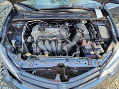 Photo 11 from auction – 2014 TOYOTA COROLLA with VIN 5YFBURHEXEP106504