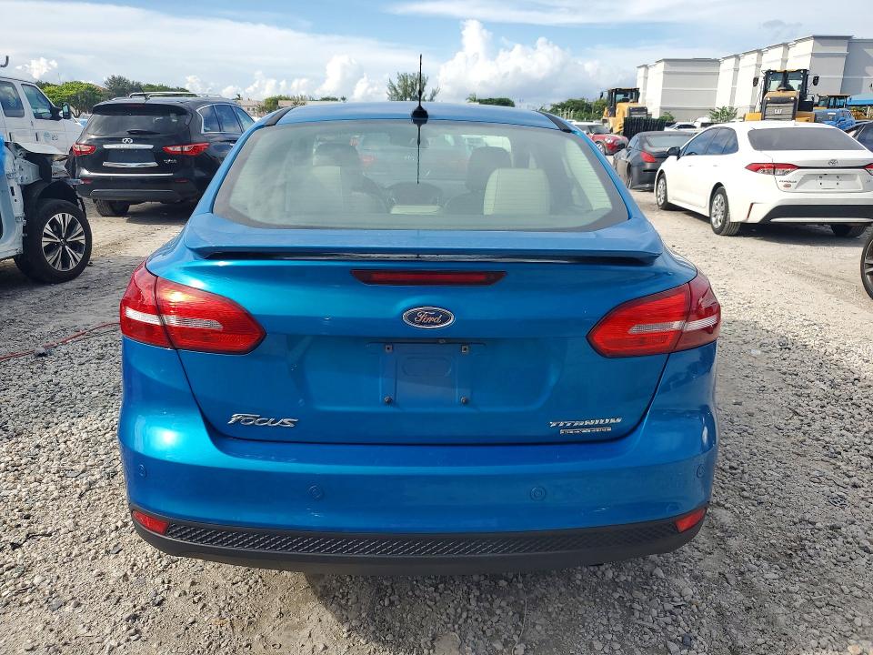 Photo 6 from auction – 2015 FORD FOCUS with VIN 1FADP3J26FL304509