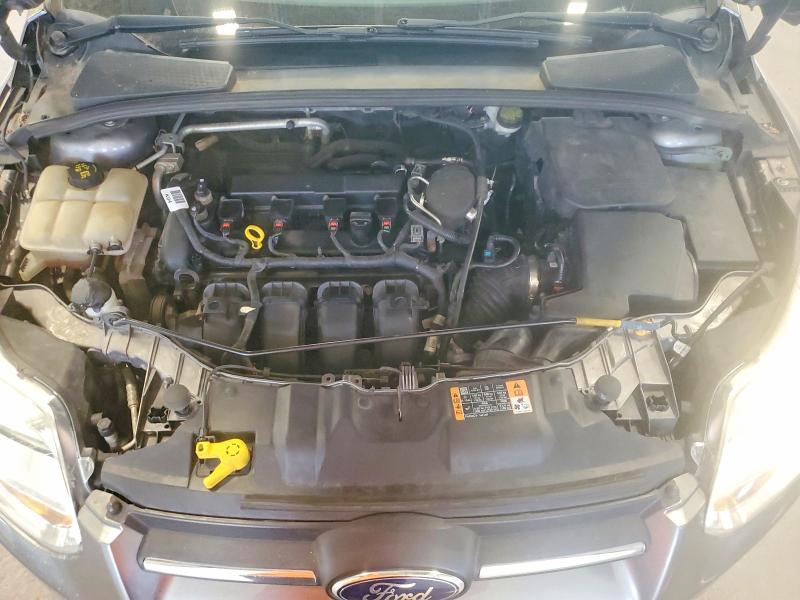 Photo 11 from auction – 2014 FORD FOCUS with VIN 1FADP3F20EL432039