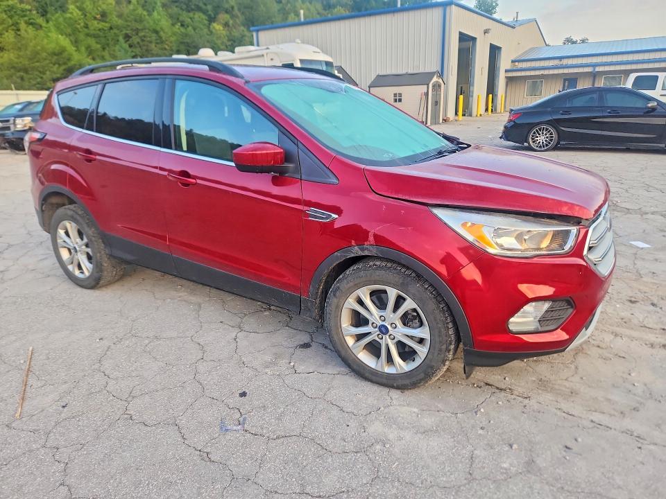 Photo 4 from auction – 2018 FORD ESCAPE with VIN 1FMCU9GD0JUC01448