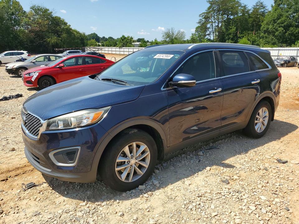KIA SORENTO 2016 with VIN 5XYPG4A3XGG060849 - Photo from auction