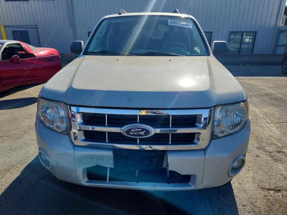 Photo 5 from auction – 2009 FORD ESCAPE with VIN 1FMCU03799KA26832