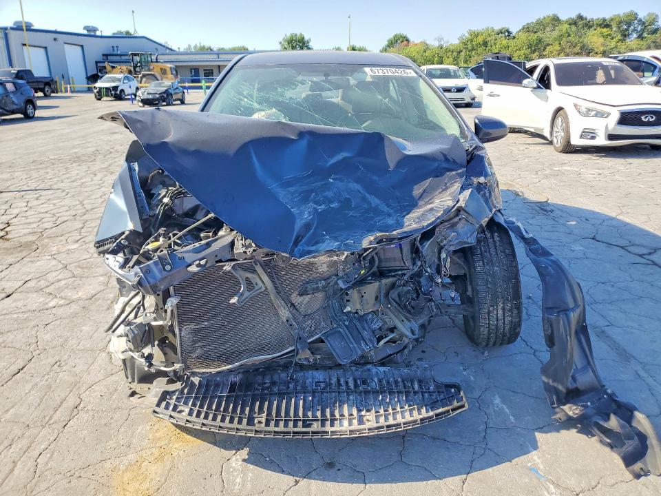 Photo 5 from auction – 2016 TOYOTA COROLLA with VIN 5YFBURHE4GP514158