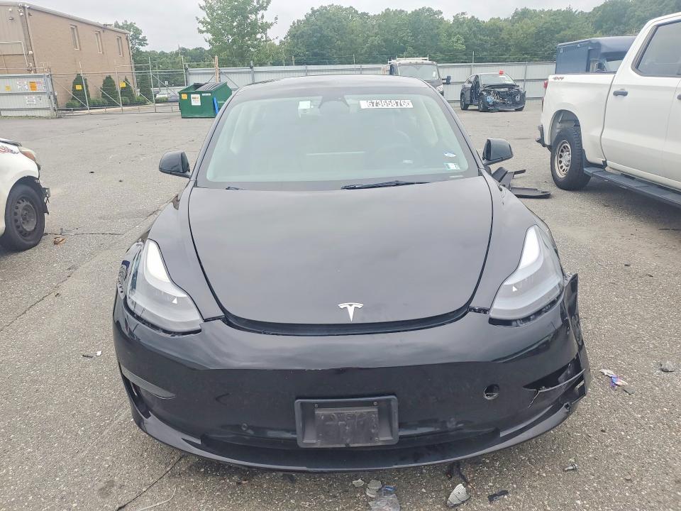 Photo 5 from auction – 2022 TESLA MODEL 3 with VIN 5YJ3E1EAXNF369012