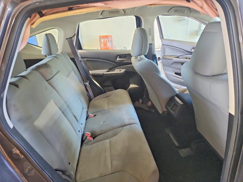Photo 11 from auction – 2015 HONDA CR-V with VIN 2HKRM4H35FH638760