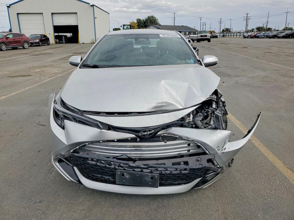 Снимка 5 от търг – 2023 TOYOTA COROLLA с VIN JTNC4MBE5P3205111