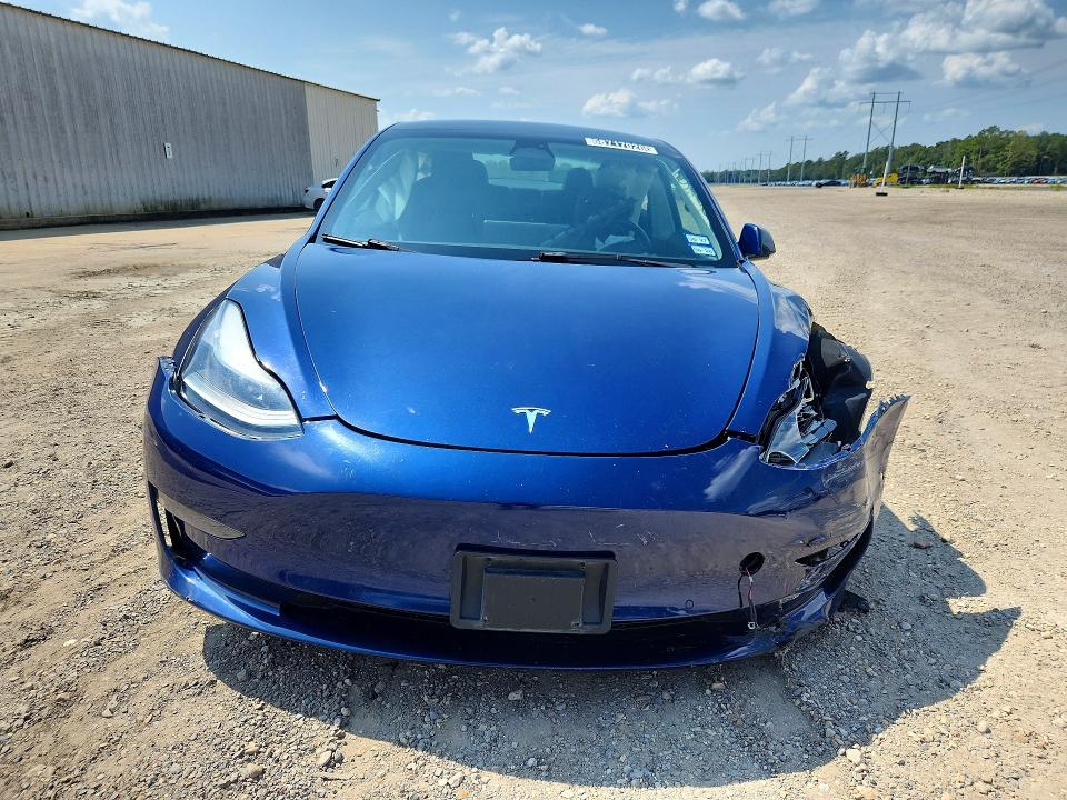 Снимка 5 от търг – 2022 TESLA MODEL 3 с VIN 5YJ3E1EA6NF285561