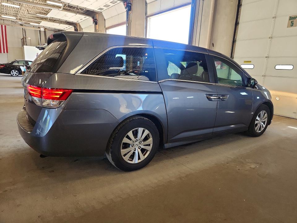 Photo 3 from auction – 2016 HONDA ODYSSEY with VIN 5FNRL5H64GB094173