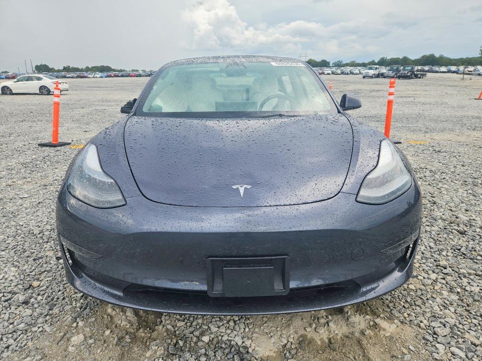 Снимка 5 от търг – 2023 TESLA MODEL 3 с VIN 5YJ3E1EA0PF714373