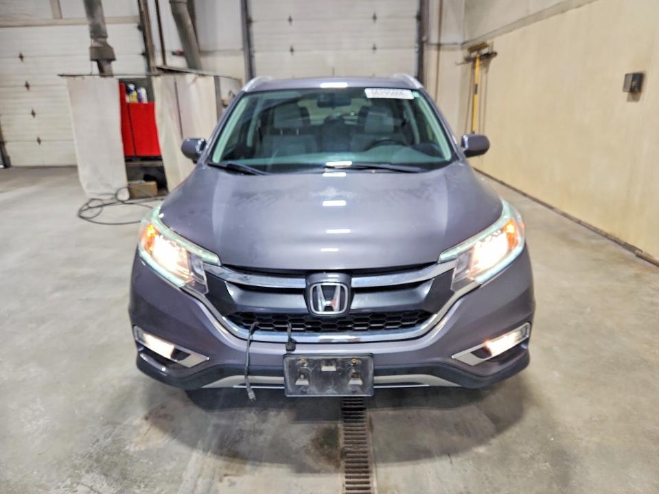 Photo 5 from auction – 2016 HONDA CR-V with VIN 2HKRM4H5XGH613419
