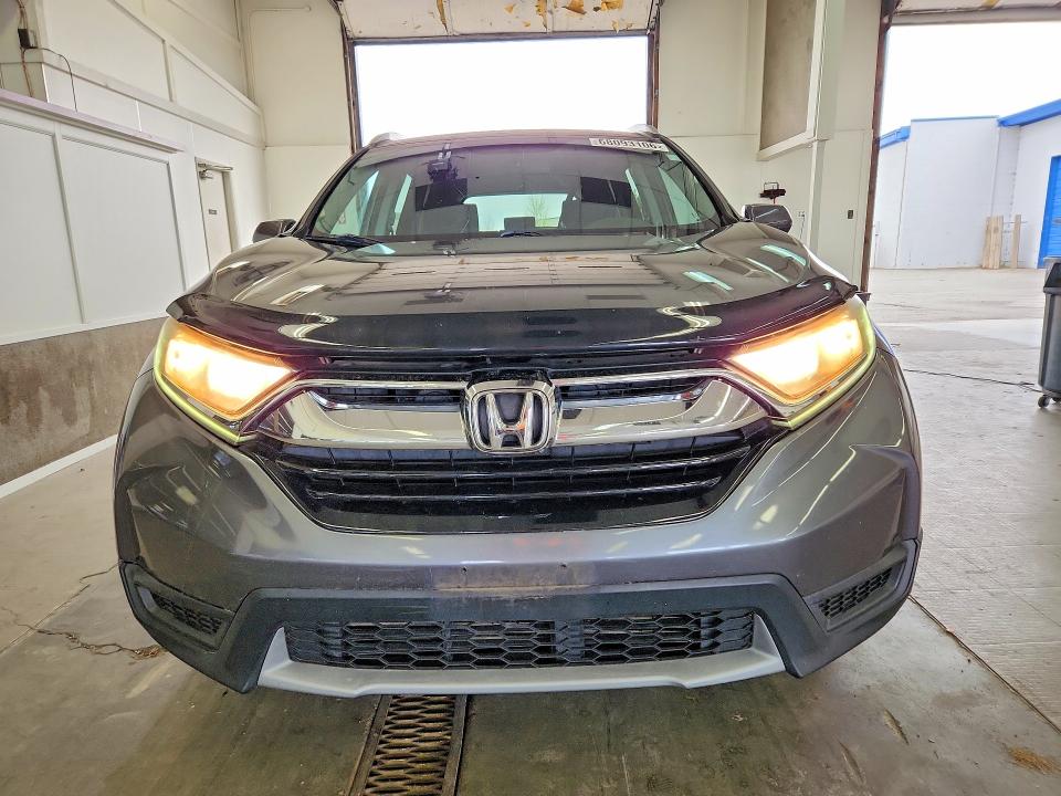 Photo 5 from auction – 2017 HONDA CR-V with VIN 2HKRW1H38HH000787