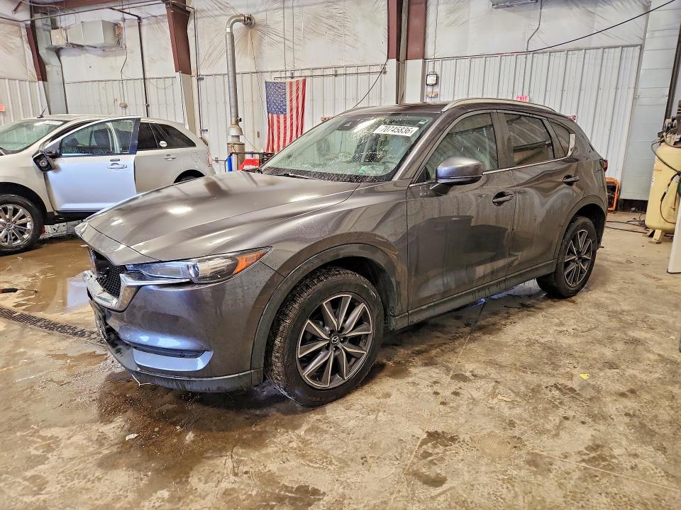 MAZDA CX-5 2018 with VIN JM3KFACM3J0322832 - Photo from auction