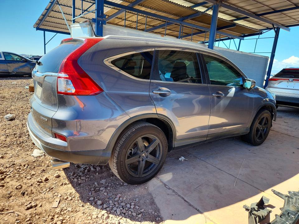 Photo 3 from auction – 2016 HONDA CR-V with VIN 5J6RM3H90GL001037