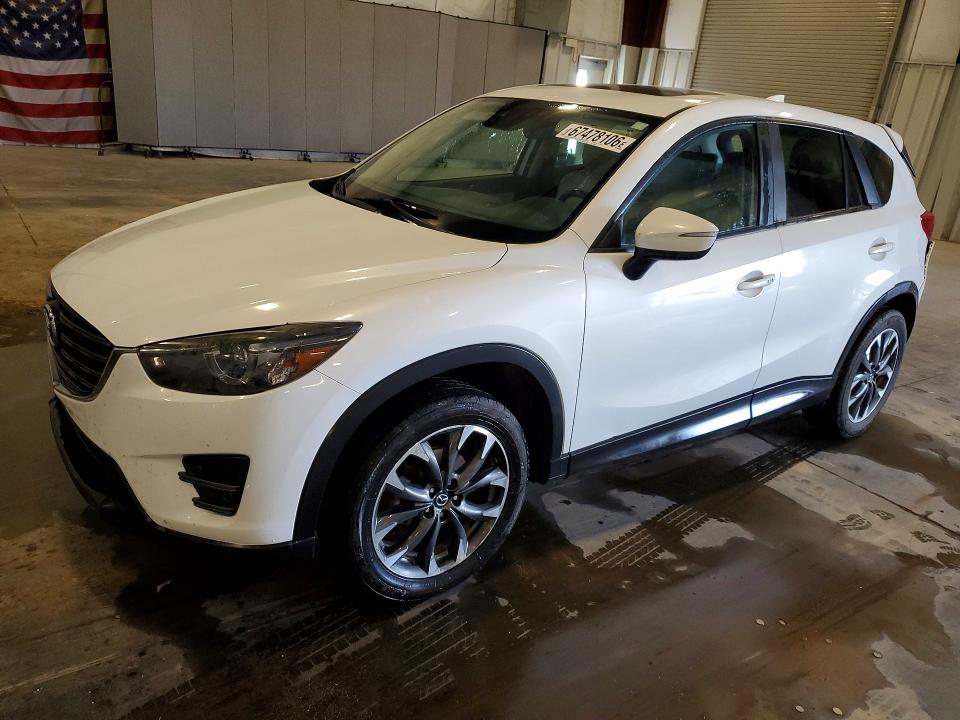 MAZDA CX-5 2016 с VIN JM3KE4DY7G0703999 - Фото с аукциона
