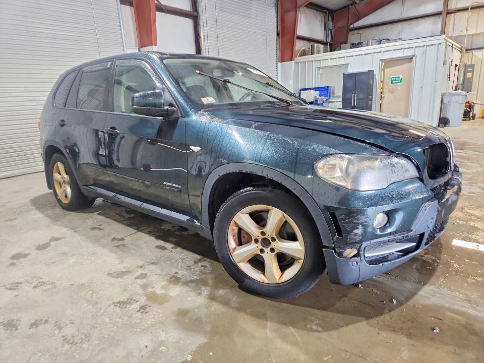 Снимка 4 от търг – 2010 BMW X5 с VIN 5UXFF0C54ALT77297
