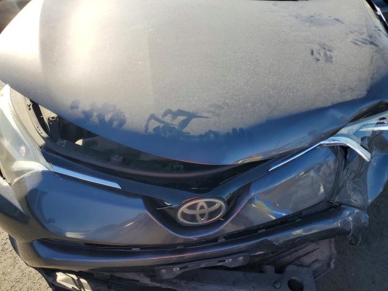 Photo 12 from auction – 2017 TOYOTA RAV4 with VIN JTMWFREV9HJ116109