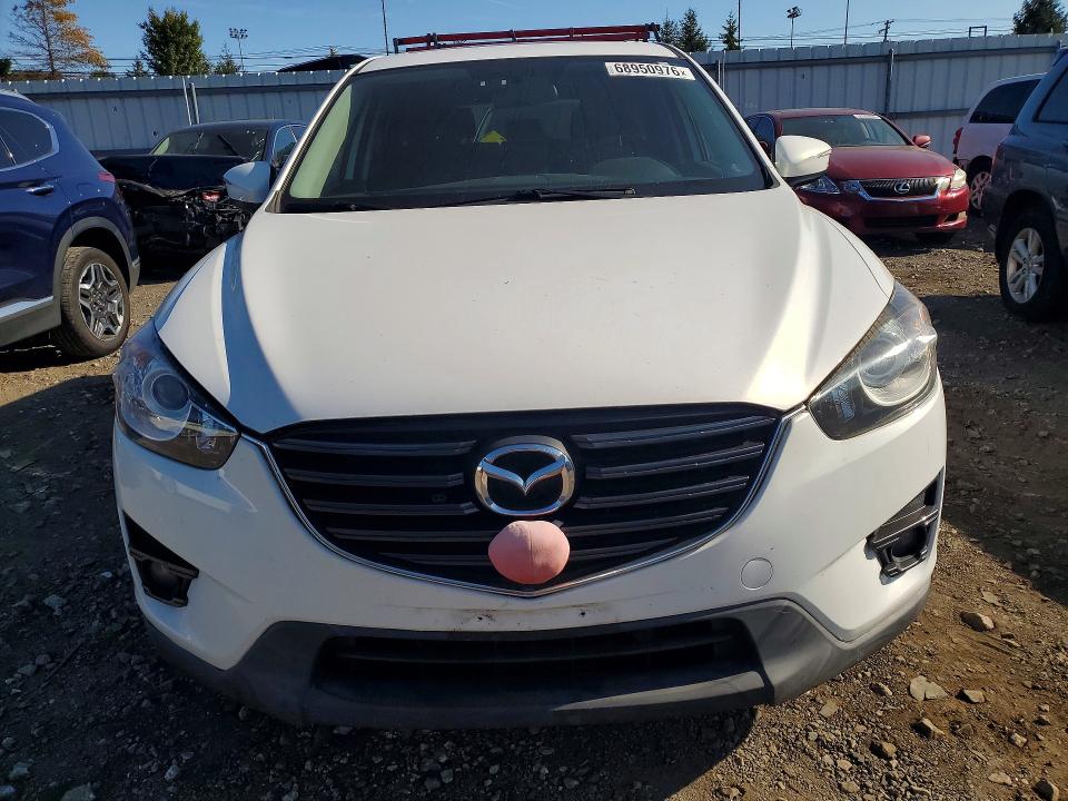 Photo 5 from auction – 2016 MAZDA CX-5 with VIN JM3KE4CY6G0917285