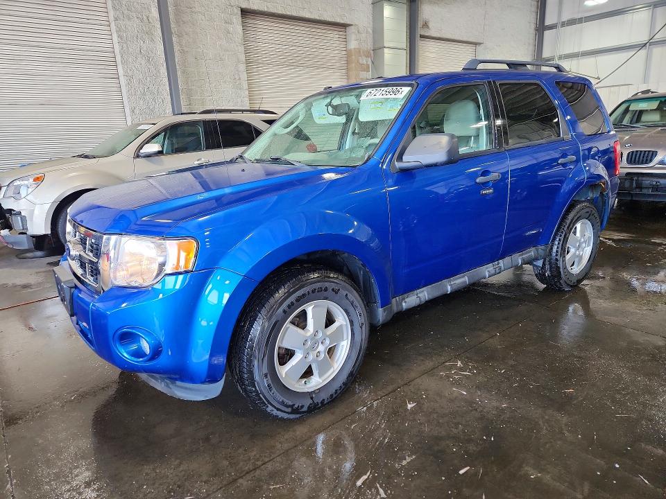 FORD ESCAPE 2011 with VIN 1FMCU0DG3BKB11010 - Photo from auction
