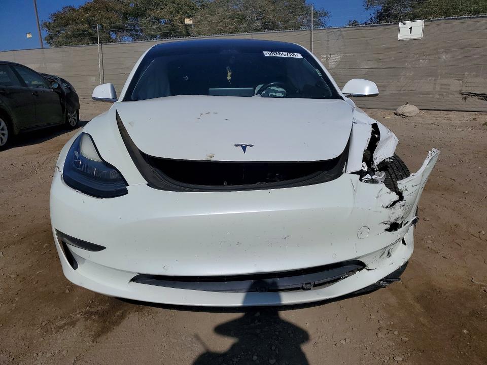 Снимка 5 от търг – 2018 TESLA MODEL 3 с VIN 5YJ3E1EA0JF051166