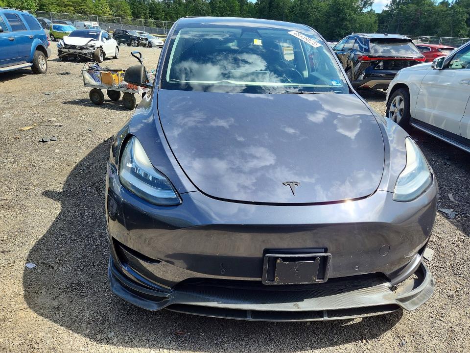 Photo 5 from auction – 2021 TESLA MODEL Y with VIN 5YJYGDED9MF134434