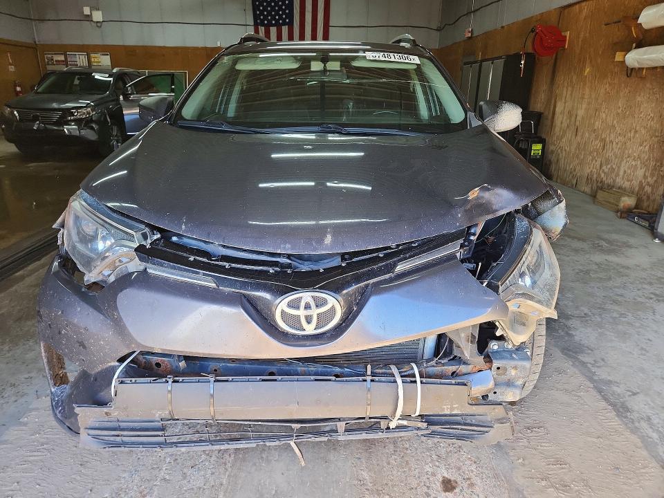 Photo 5 from auction – 2016 TOYOTA RAV4 with VIN 2T3RFREV6GW437764