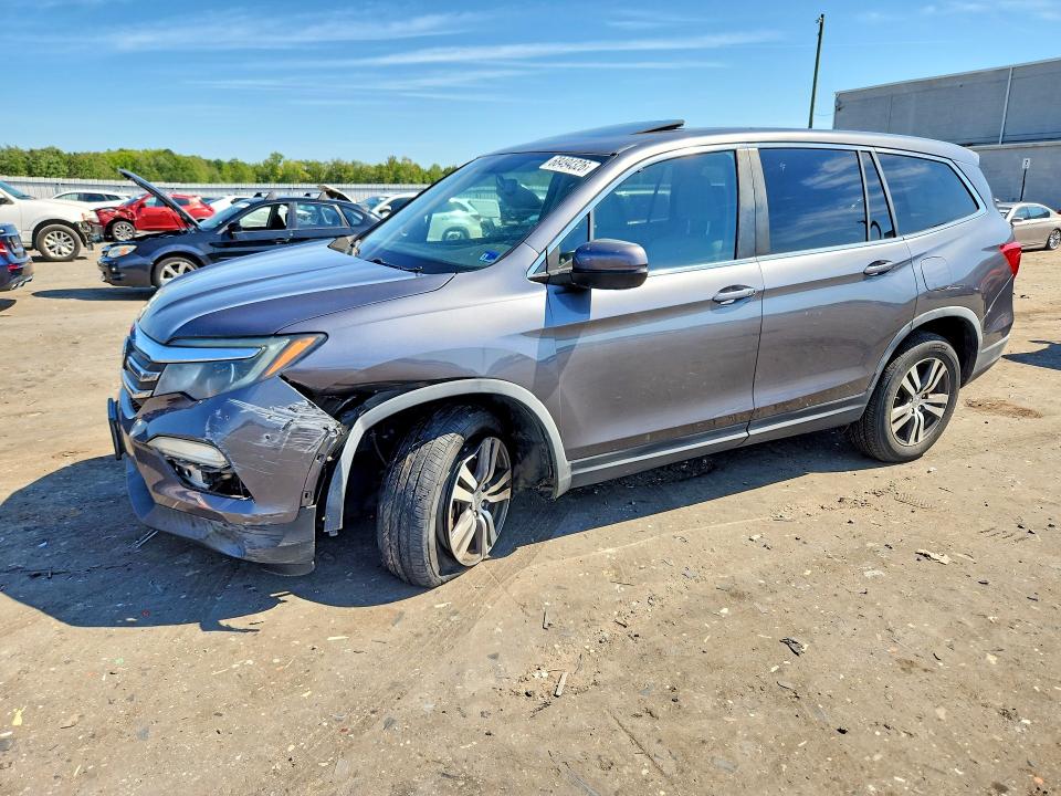 HONDA PILOT 2016 с VIN 5FNYF6H5XGB073263 - Снимка от търг
