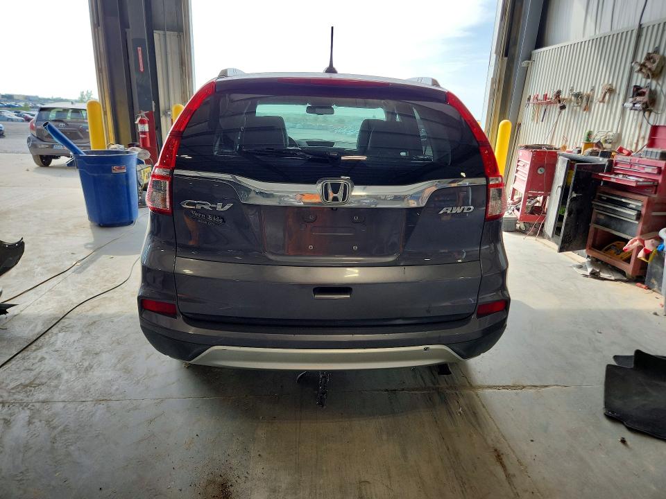 Photo 6 from auction – 2016 HONDA CR-V with VIN 2HKRM4H77GH719182