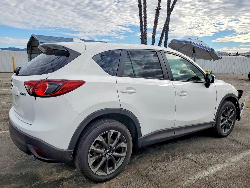 Photo 3 from auction – 2016 MAZDA CX-5 with VIN JM3KE2DY0G0876493