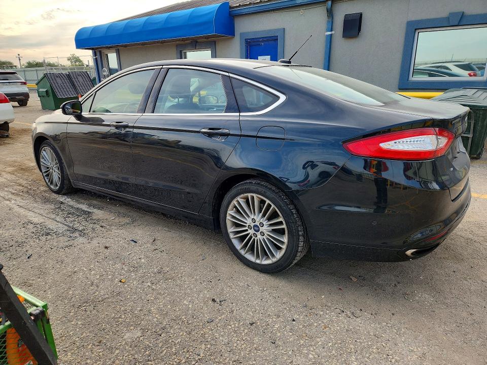 Foto 2 de la subasta – 2014 FORD FUSION con VIN 3FA6P0H93ER146012