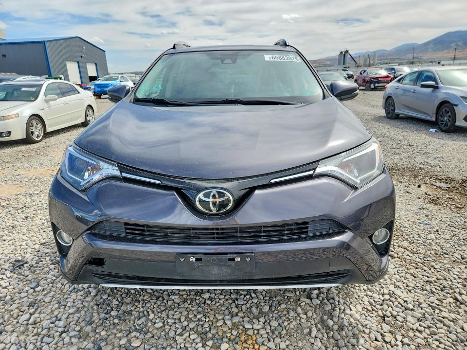 Photo 5 from auction – 2018 TOYOTA RAV4 with VIN JTMRFREV6JJ720297