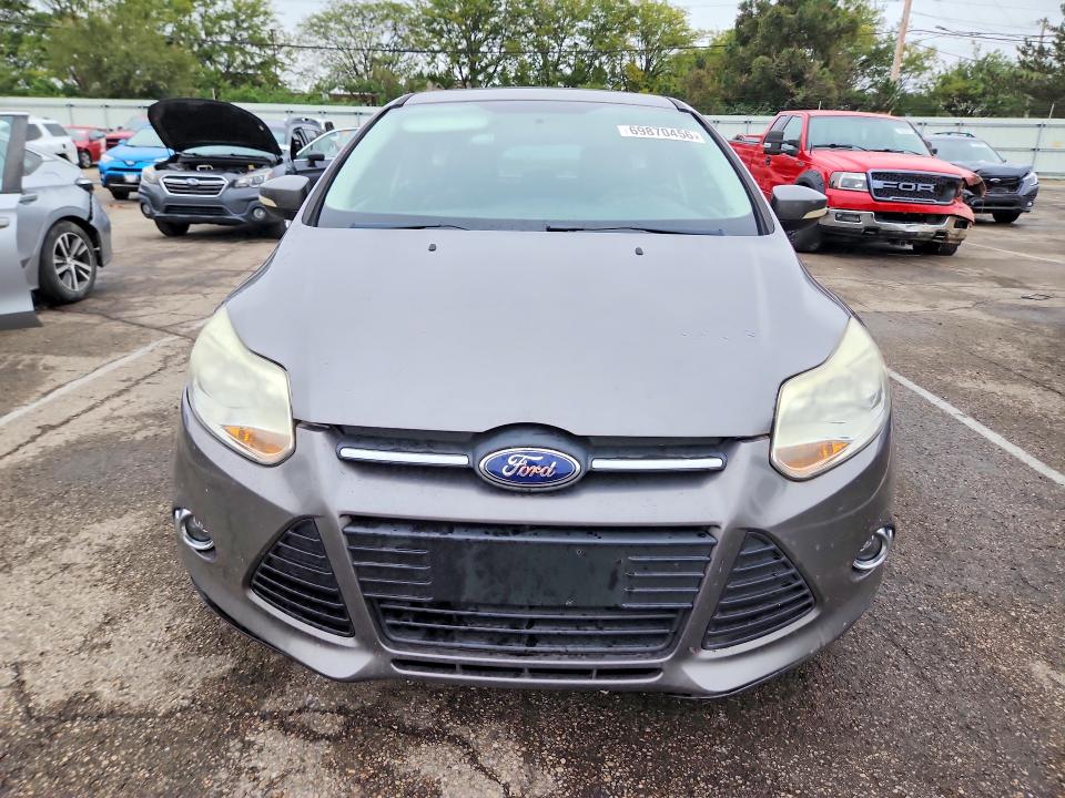 Снимка 5 от търг – 2014 FORD FOCUS с VIN 1FADP3K22EL166058