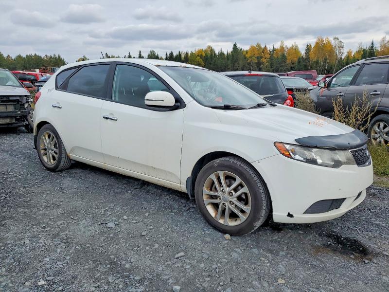 Photo 4 from auction – 2012 KIA FORTE with VIN KNAFU5A29C5558252