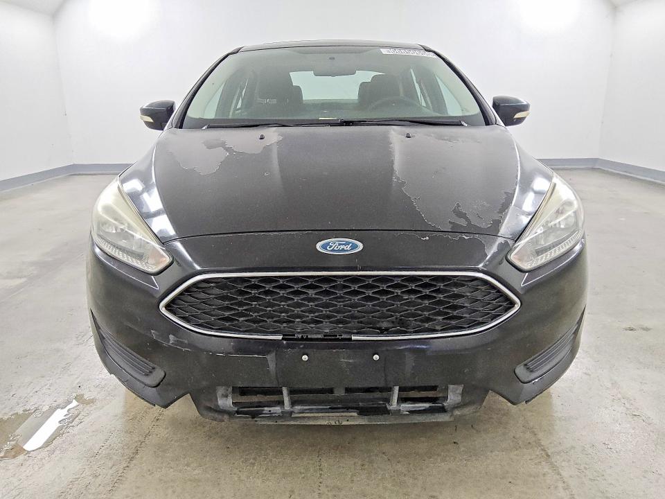 Photo 5 from auction – 2015 FORD FOCUS with VIN 1FADP3F20FL206116