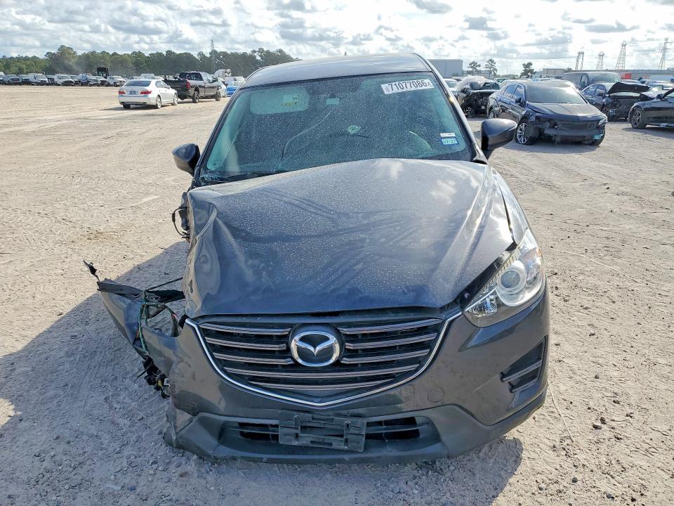 Снимка 5 от търг – 2016 MAZDA CX-5 с VIN JM3KE2BY6G0821355