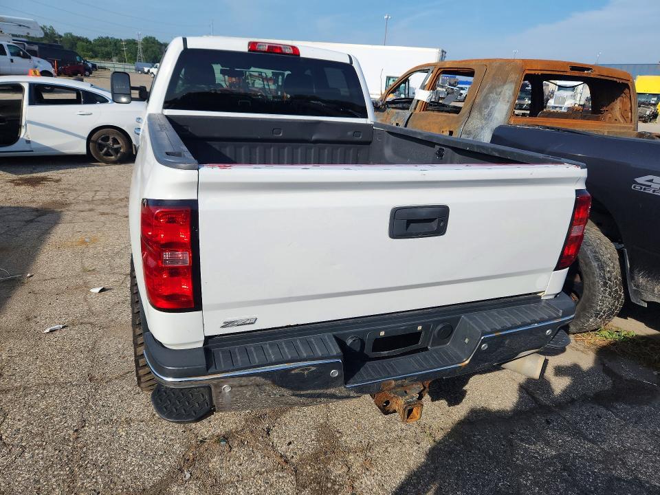 Photo 6 from auction – 2015 CHEVROLET SILVERADO with VIN 1GC1KWE86FF157862