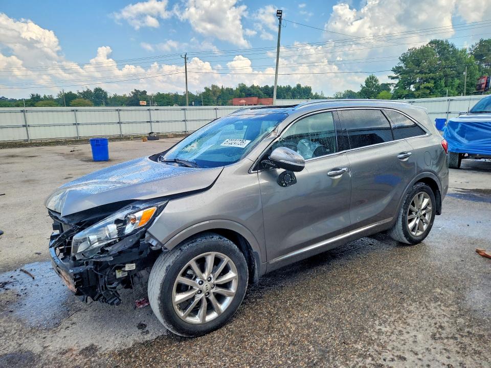 KIA SORENTO 2016 with VIN 5XYPK4A57GG121820 - Photo from auction