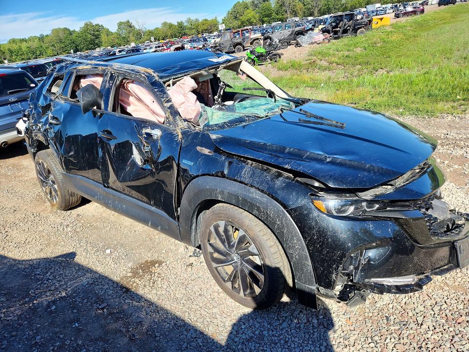 Photo 4 from auction – 2025 MAZDA CX-50 with VIN 7MMVAAEW0SN137970