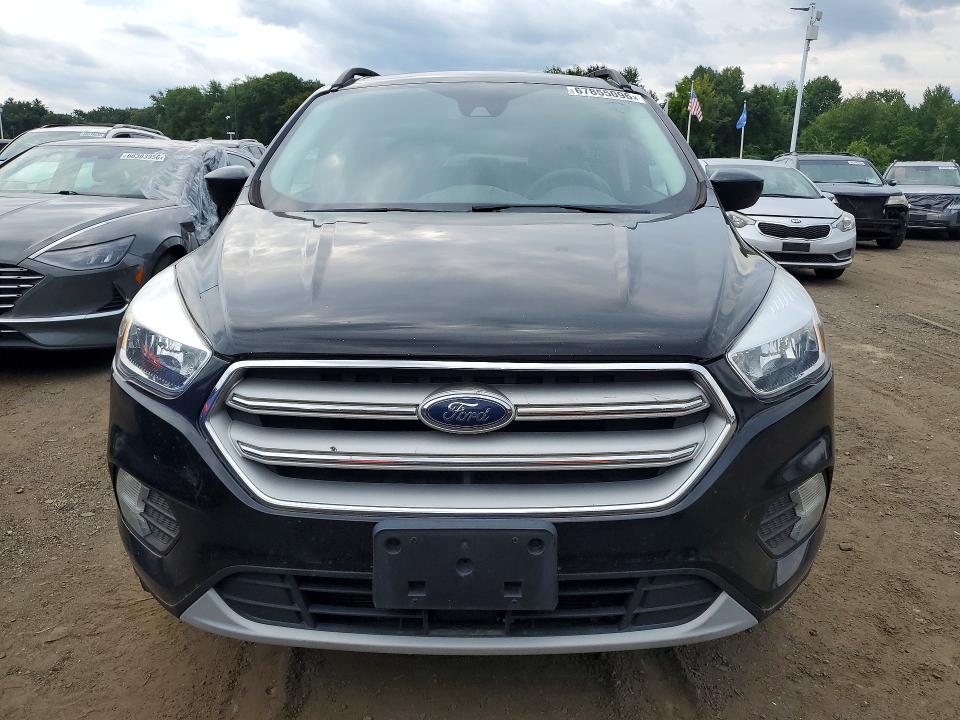 Photo 5 from auction – 2018 FORD ESCAPE with VIN 1FMCU9GD9JUB76128