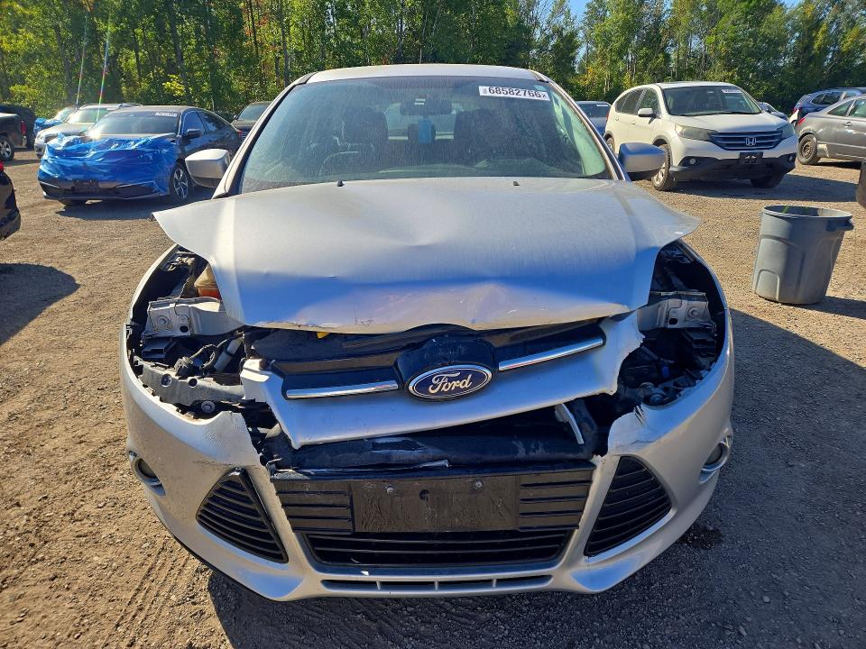 Снимка 5 от търг – 2012 FORD FOCUS с VIN 1FAHP3K28CL165110