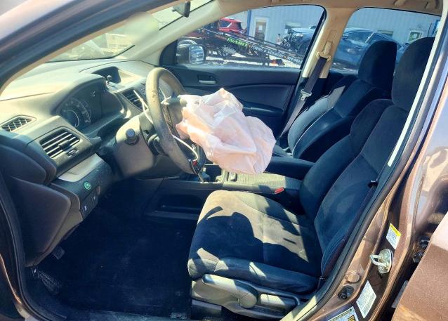 Photo 7 from auction – 2014 HONDA CR-V with VIN 5J6RM4H34EL072014