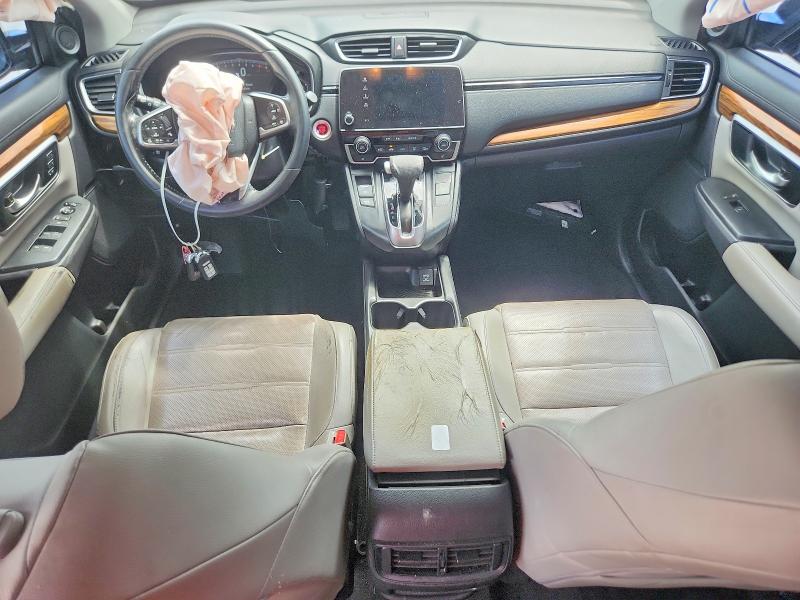 Photo 8 from auction – 2017 HONDA CR-V with VIN 7FARW1H83HE010366