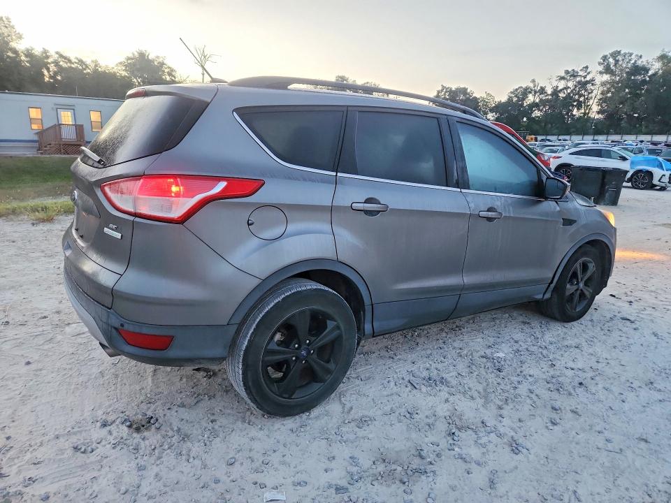 Photo 3 from auction – 2014 FORD ESCAPE with VIN 1FMCU0G91EUD14211