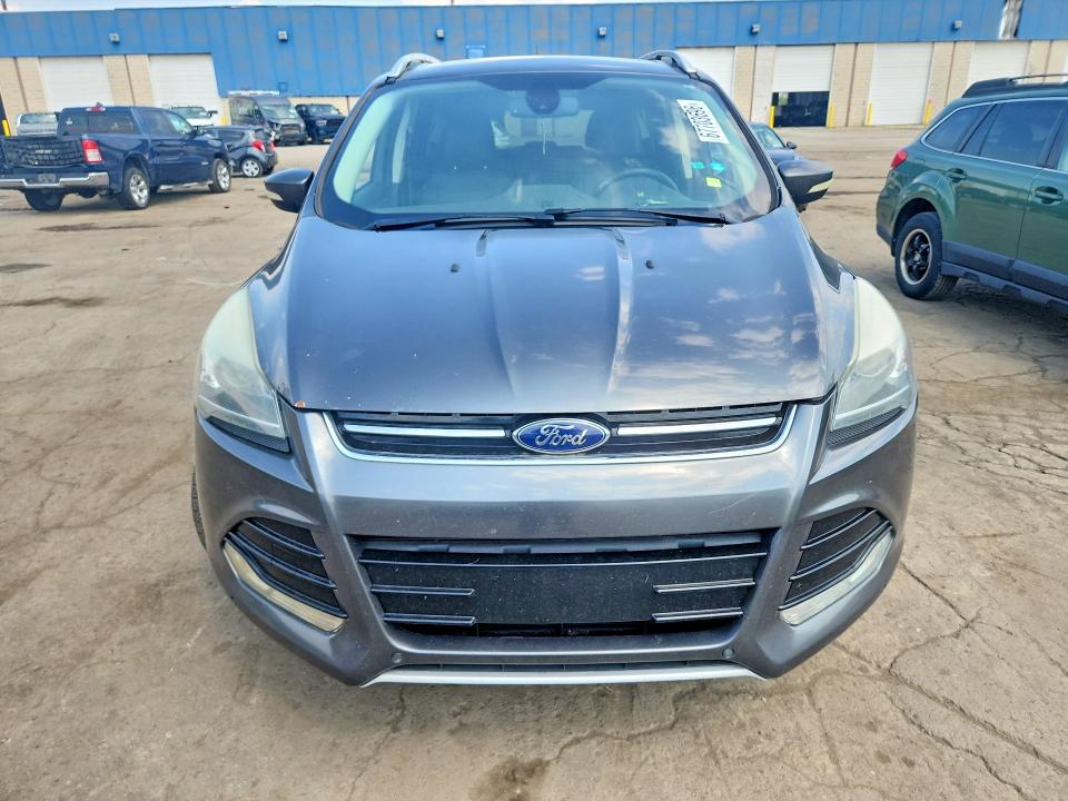 Photo 5 from auction – 2016 FORD ESCAPE with VIN 1FMCU9JX2GUA95998